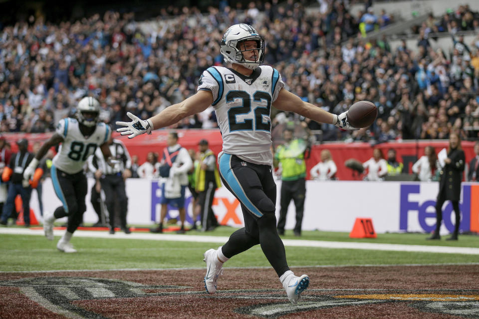 Carolina Panthers running back Christian McCaffrey (22) reacts after scoring a touchdown against the Tampa Bay Buccaneers during the second quarter of an NFL football game, Sunday, Oct. 13, 2019, at Tottenham Hotspur Stadium in London. (AP Photo/Tim Ireland)