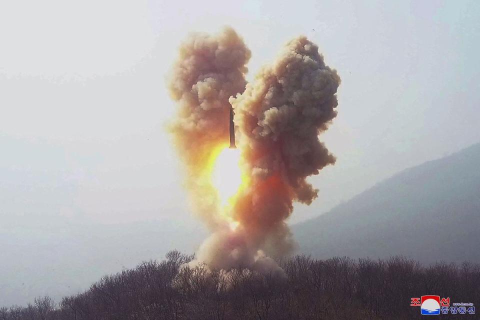 This picture taken on 19 March shows a warhead missile launch exercise simulating a tactical nuclear attack in Cholsan county, North Pyongan province (KCNA VIA KNS/AFP via Getty Image)