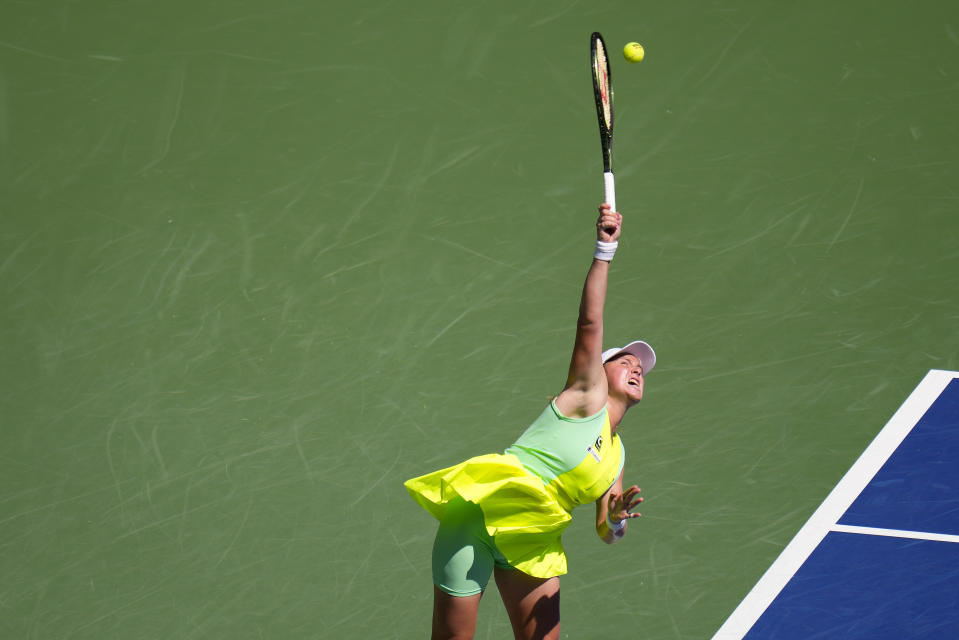 Jelena Ostapenko, of Latvia, serves to Coco Gauff, of the United States, during the quarterfinals of the U.S. Open tennis championships, Tuesday, Sept. 5, 2023, in New York. (AP Photo/Manu Fernandez)