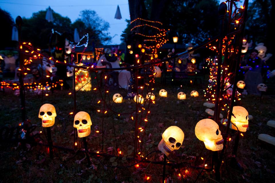 Hundreds of Halloween decorations cover the yard of Tom Freeman and Lane Freeman's home in West Hills in 2013.