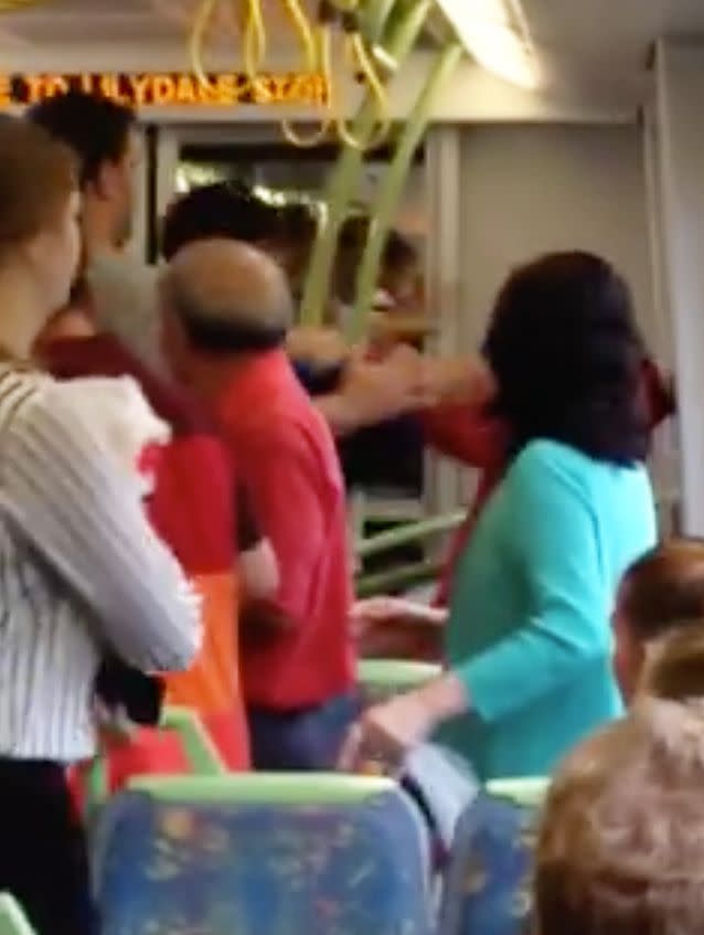 The trouble started after a man allegedly launched an offensive tirade towards an elderly Indian woman on a Melbourne train. Photo: Facebook