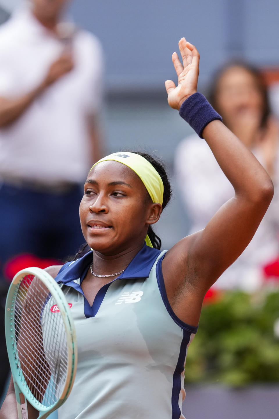 Coco Gauff of the United States waves to the crowd after winning Arantxa Rus of Netherlands during the Mutua Madrid Open tennis tournament in Madrid, Thursday, April 25, 2024. (AP Photo/Manu Fernandez)