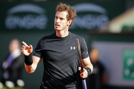Andy Murray of Britain reacts during the men's singles match against Facundo Arguello of Argentina at the French Open tennis tournament at the Roland Garros stadium in Paris, France, May 25, 2015. REUTERS/Jean-Paul Pelissier