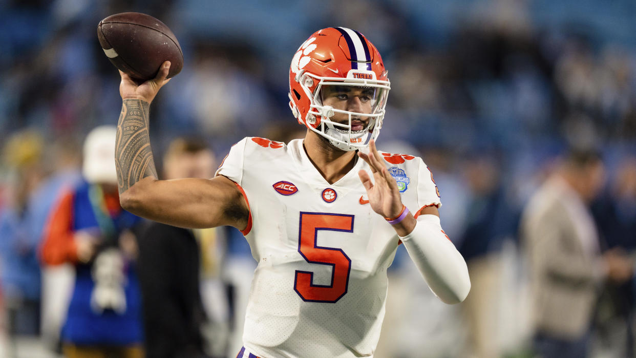 Clemson quarterback DJ Uiagalelei (5) warms up before the Atlantic Coast Conference championship NCAA college football game against North Carolina on Saturday, Dec. 3, 2022, in Charlotte, N.C. (AP Photo/Jacob Kupferman)