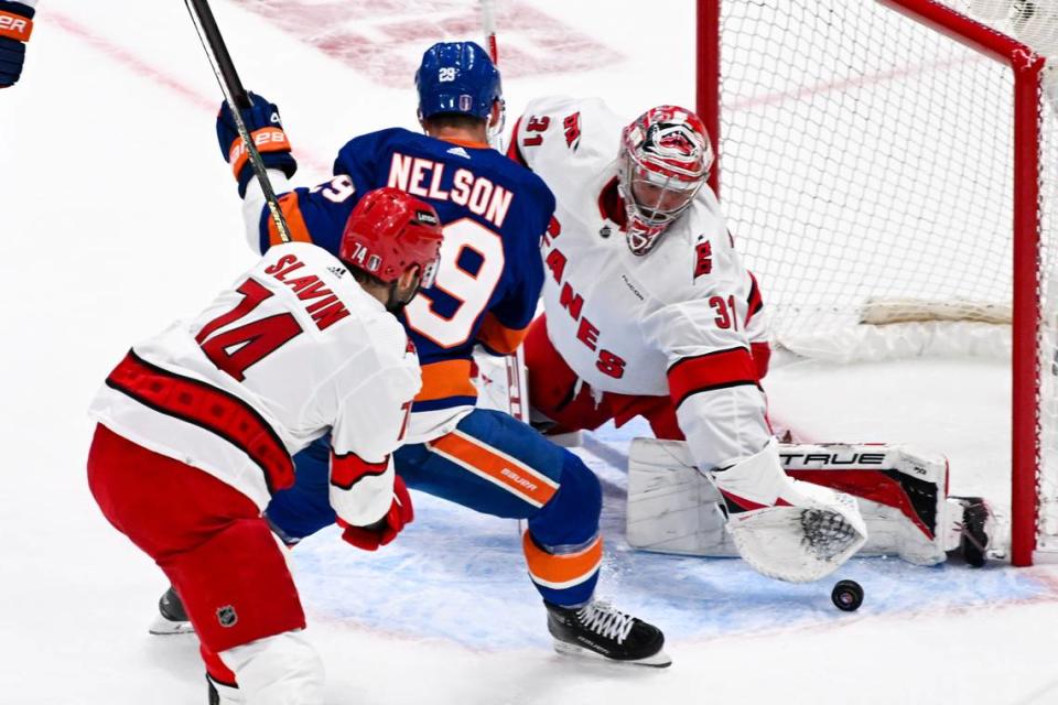 Apr 25, 2024; Elmont, New York, USA; Carolina Hurricanes goaltender Frederik Andersen (31) makes a save against the New York Islanders during the first period in game three of the first round of the 2024 Stanley Cup Playoffs at UBS Arena. Mandatory Credit: Dennis Schneidler-USA TODAY Sports Dennis Schneidler/Dennis Schneidler-USA TODAY Sports