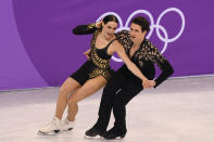 <p>Canada’s Scott Moir and Canada’s Tessa Virtue compete in the figure skating team event ice dance short dance during the Pyeongchang 2018 Winter Olympic Games at the Gangneung Ice Arena in Gangneung on February 11, 2018. / AFP PHOTO / Roberto SCHMIDT </p>