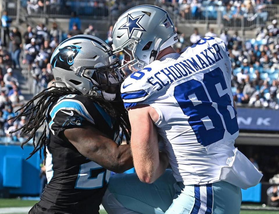 Carolina Panthers cornerback Donte Jackson, left, is unable to stop Dallas Cowboys tight end Luke Schoonmaker, right, from catching a touchdown pass in the end zone during first-quarter action at Bank of America Stadium in Charlotte, NC on Sunday, November 19, 2023.