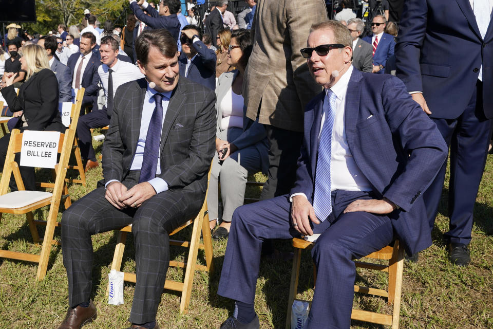 Jim Farley, Ford president and CEO, left, and Ford Executive Chairman Bill Ford, right, talk before a presentation on the planned factory to build electric F-Series trucks and the batteries to power future electric Ford and Lincoln vehicles Tuesday, Sept. 28, 2021, in Memphis, Tenn. The plant in Tennessee is to be built near Stanton, Tenn. (AP Photo/Mark Humphrey)