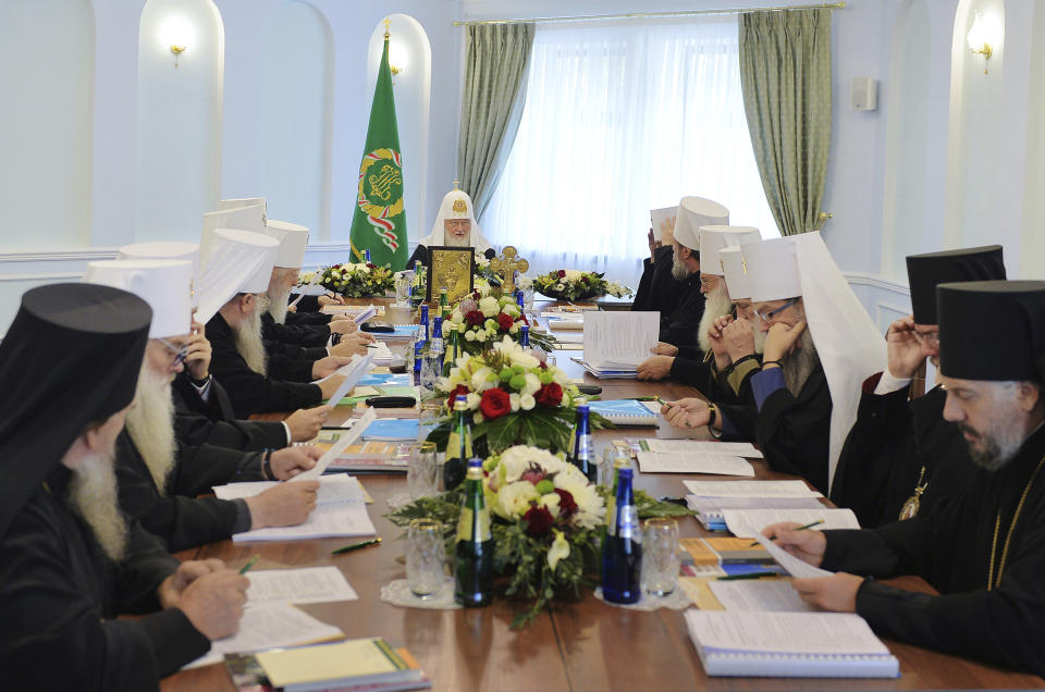 Russian Orthodox Church Patriarch Kirill chairs a meeting of the Russian Orthodox Church Holy Synod in Minsk, Belarus, Monday, Oct. 15, 2018. (Igor Palkin/Russian Orthodox Church Press Service via AP)