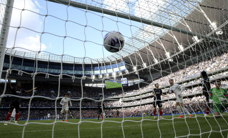 The ball hits the back of the net after Tottenham Hotspur's Son Heung-Min scored his side's second goal during the English Premier League soccer match between Tottenham Hotspur and Luton Town at the Tottenham Hotspur Stadium, London, Saturday, March 30, 2024. (Steven Paston/PA via AP)