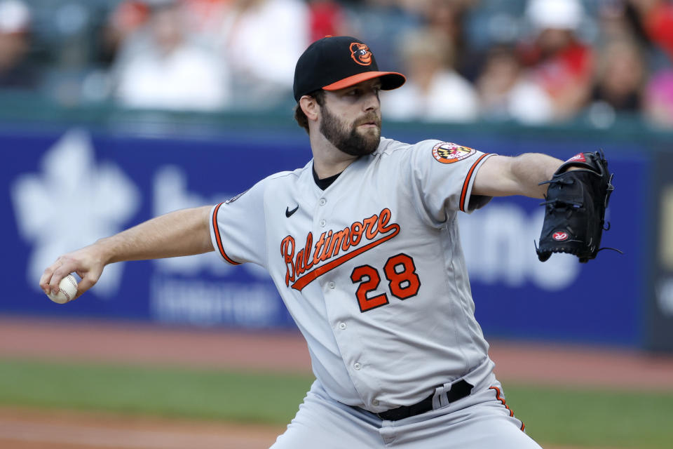 Baltimore Orioles starting pitcher Jordan Lyles delivers against the Cleveland Guardians during the first inning of a baseball game Wednesday, Aug. 31, 2022, in Cleveland. (AP Photo/Ron Schwane)