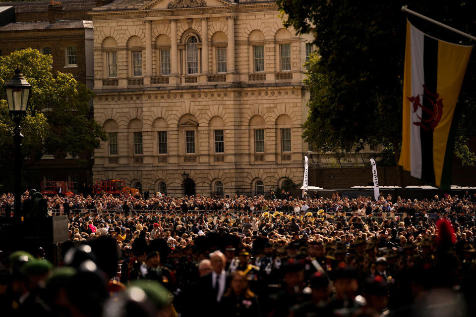 People gather prior to the Queen Elizabeth II funeral in central London.<span class="copyright">Andreea Alexandru—Pool/AP</span>