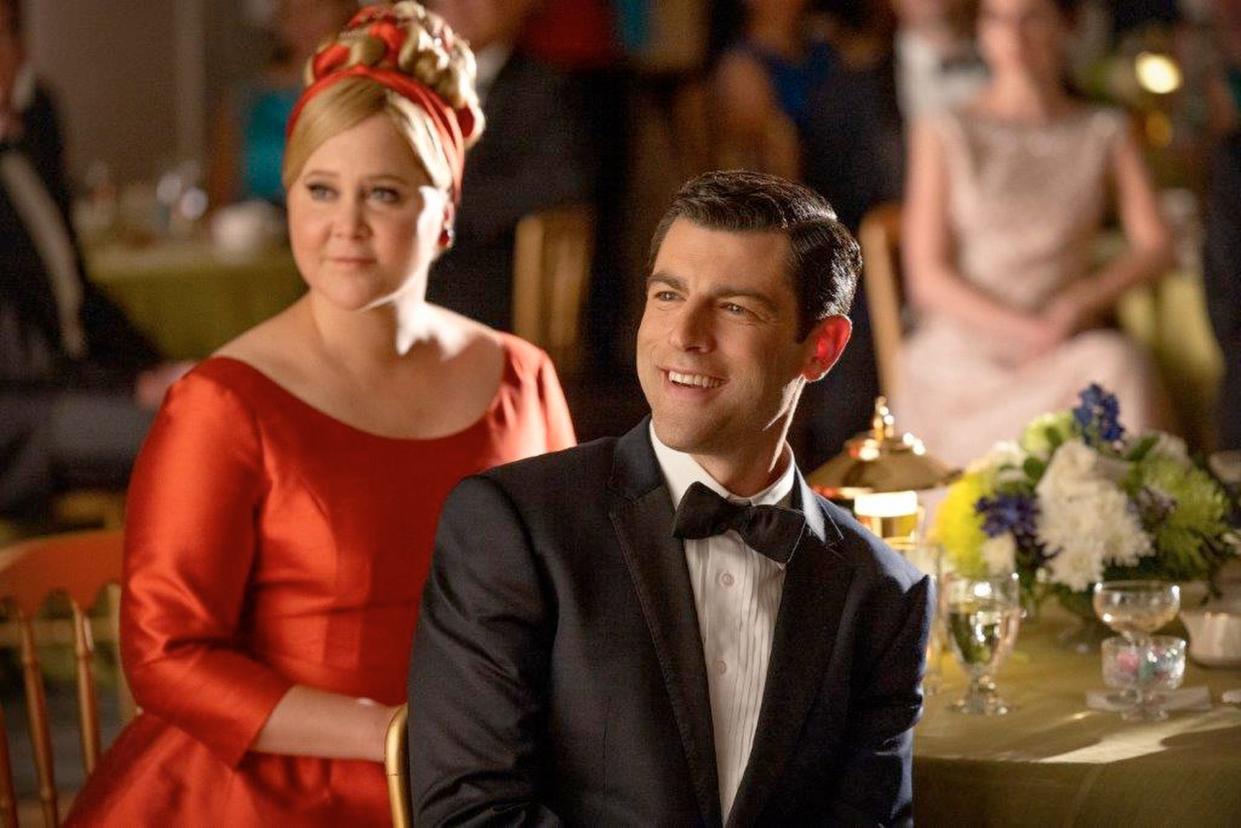 (L to R) Amy Schumer as Marjorie Post and Max Greenfield as Rick Ludwin in Netflix's "Unfrosted."