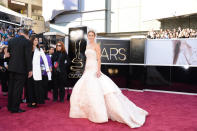 <p>Who could forget J. Law’s cloud-like Christian Dior dress that she wore to the Oscars three years ago? This was the same year she won our hearts when she fell up the stairs on her way to accept her best actress award. <i>(Photo by Jason Merritt/Getty Images)</i></p>