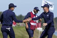 Team USA's Justin Thomas and Team USA's Jordan Spieth celebrate on the 16th hole during a foursomes match the Ryder Cup at the Whistling Straits Golf Course Saturday, Sept. 25, 2021, in Sheboygan, Wis. (AP Photo/Jeff Roberson)