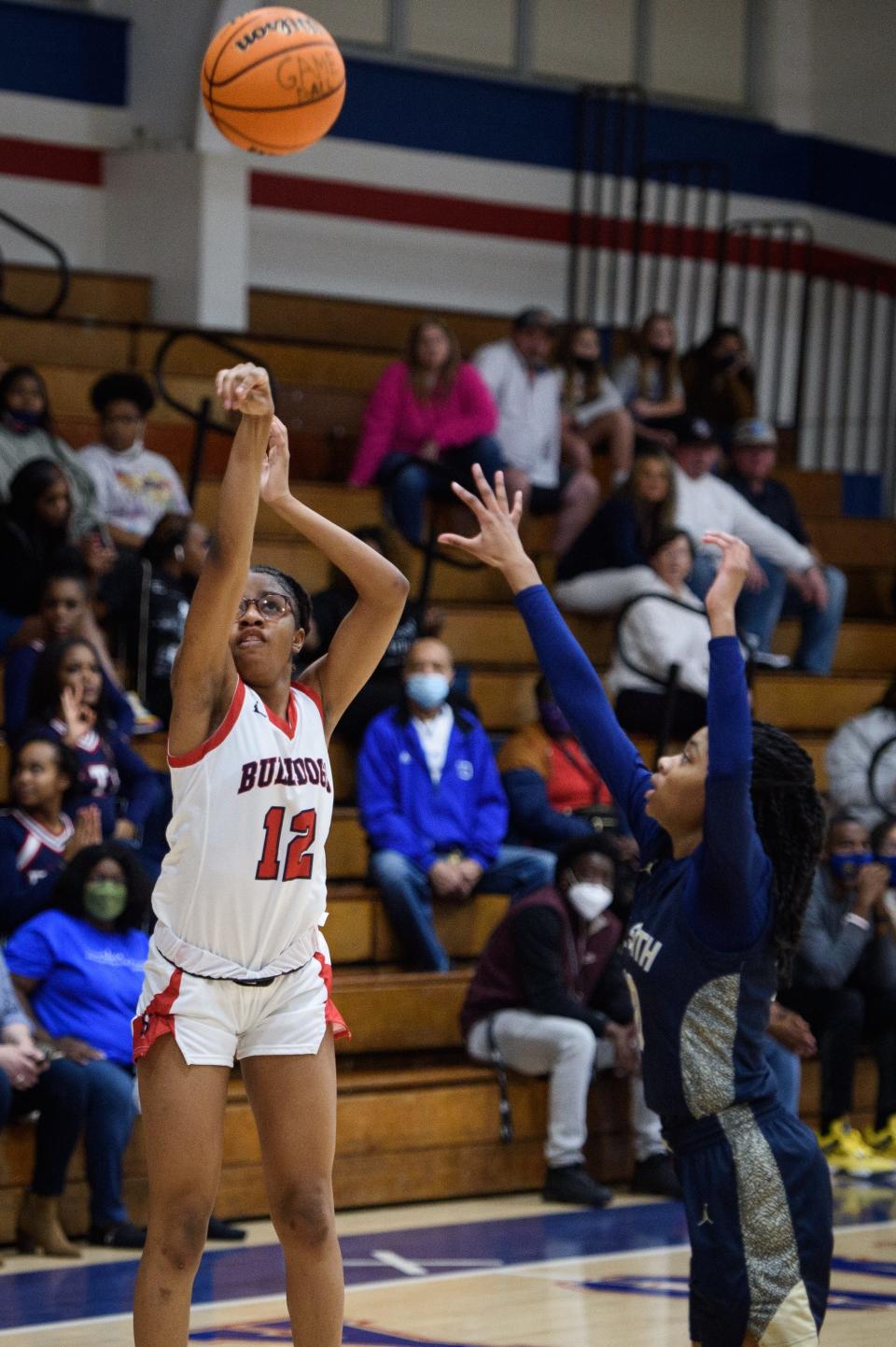 Breonna Roaf follows through with a shot during the E.E. Smith at Terry Sanford girls’ basketball game on Friday, Feb. 18, 2022.