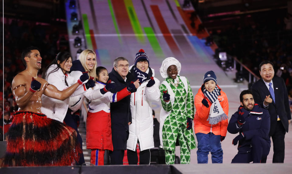 Pita Taufatofua, far left, once again made an Olympics ceremony his own personal showcase. (AP)