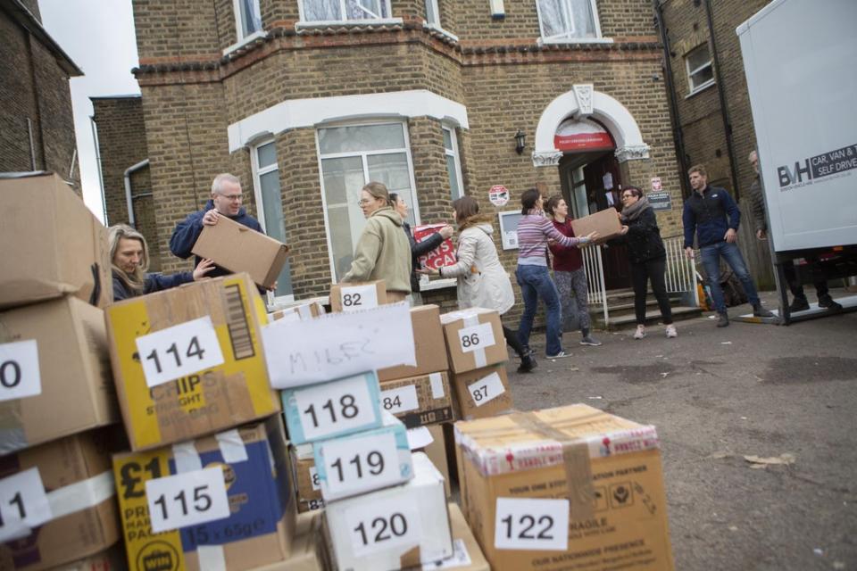 Volunteers prepare to load a van with donations for Ukrainian refugees which will be driven from the Lewisham Polish Centre in south London to Poland (Rick Findler/PA) (PA Wire)