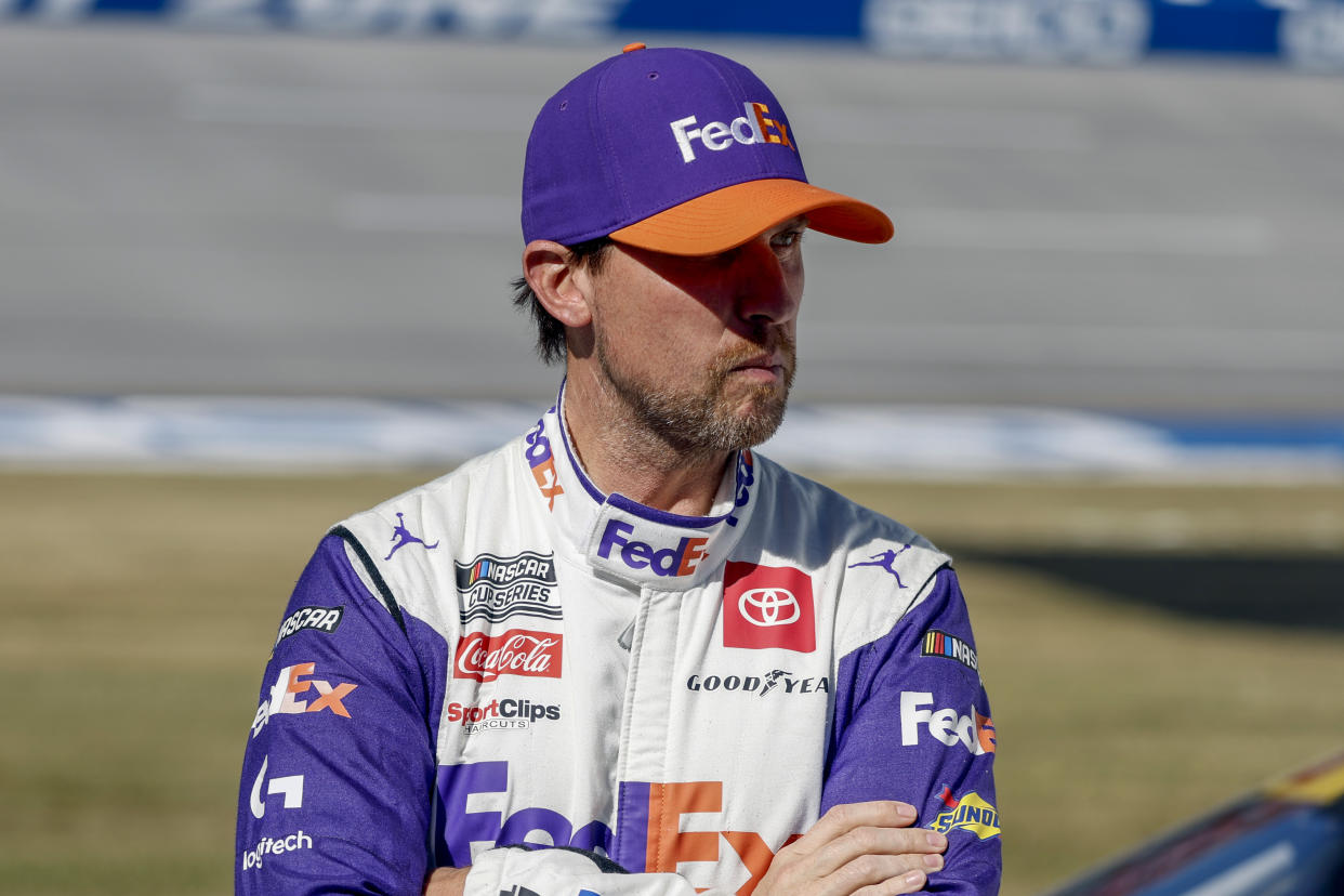 Driver Denny Hamlin waits to qualify during qualifying for the NASCAR YellaWood 500 auto race Saturday, Oct. 1, 2022, in Talladega, Ala. (AP Photo/Butch Dill)