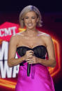 Iliza Shlesinger presents the award for collaborative video of the year at the CMT Music Awards at the Bridgestone Arena on Wednesday, June 9, 2021, in Nashville, Tenn. (AP Photo/Mark Humphrey)