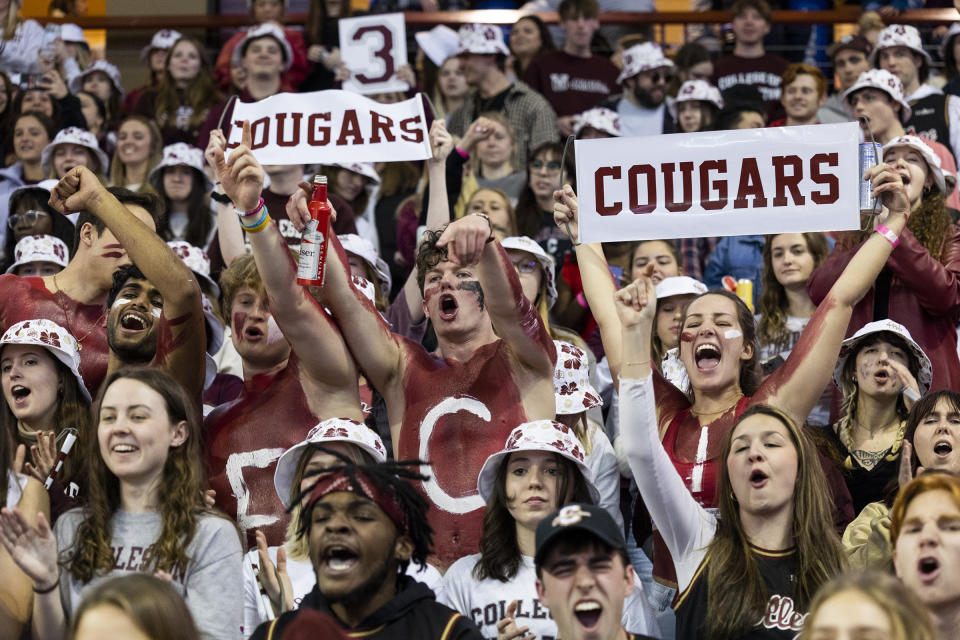 College of Charleston fans cheer for their team before an NCAA college basketball game against Elon in Charleston, S.C., Saturday, Jan. 14, 2023. (AP Photo/Mic Smith)