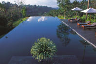 Infinity pool at Alila Ubud, Bali. This hotel is located high in the central foothills of Bali. Its deep-green infinity pool not only blends into the lush landscape but almost seems to extend out right over the edge of the hill. (www.alilahotels.com/ubud)