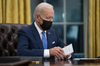 FILE - In this Feb. 2, 2021, file photo President Joe Biden delivers remarks on immigration, in the Oval Office of the White House in Washington. (AP Photo/Evan Vucci, File)