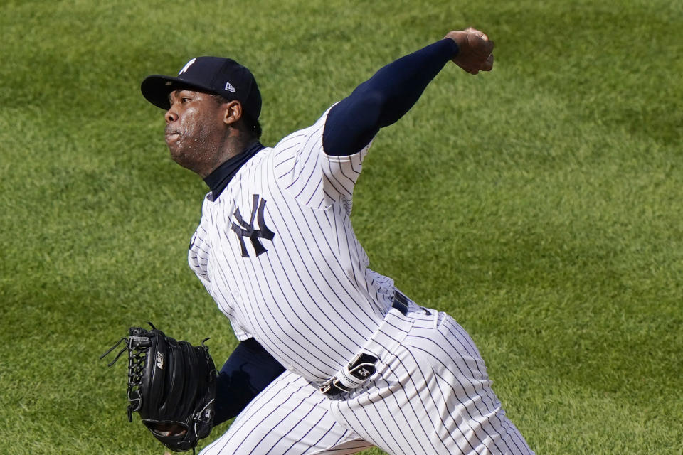 New York Yankees relief pitcher Aroldis Chapman winds up during the ninth inning of a baseball game against the Baltimore Orioles, Sunday, Sept. 13, 2020, at Yankee Stadium in New York. Chapman earned a save in the Yankees victory over the Baltimore Orioles. (AP Photo/Kathy Willens)