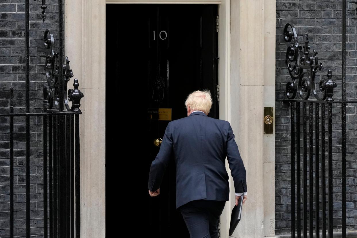 Johnson said Thursday he will remain as British prime minister while a leadership contest is held to choose his successor.