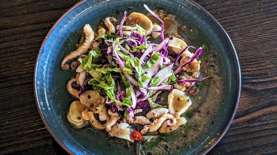 A classic Spanish preparation, the Baby Octopus 'al ajillo' gets a nice lift from the salad and a touch of citrus.