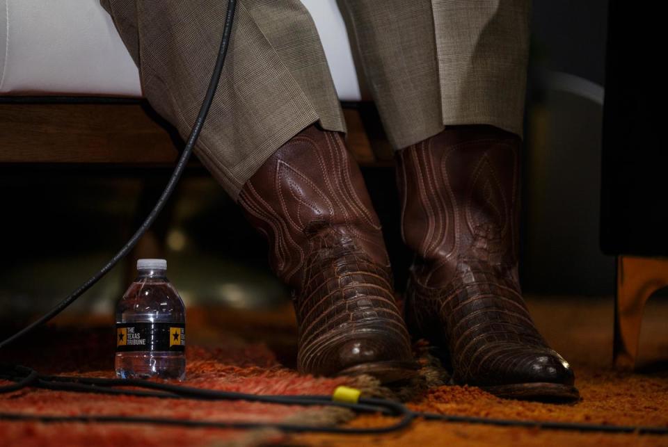 Bart Barber, the President of the Southern Baptist Convention, sports a pair of cowboy boots on Friday. <cite>Credit: Julius Shieh/The Texas Tribune</cite>