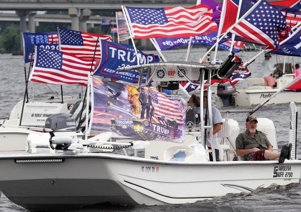 Boats with flags and campaign colors display along the Trent River and Neuse River for the New Bern Waterfront Trump Parade held in New Bern, NC, June 13, 2020. The event attracted boaters and onlookers at Union Point Park in support of President Donald J. Trump and state candidates of the Republican Party of North Carolina.