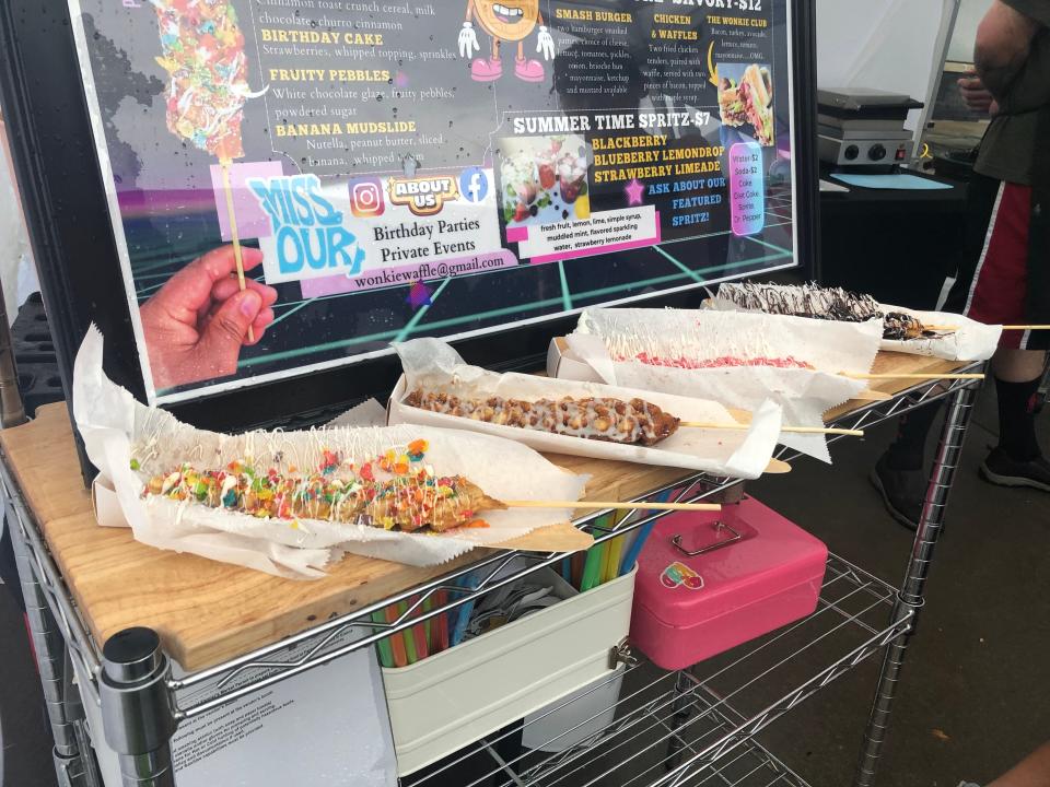 The Wonkie Waffle displays various versions of its signature waffle stick at the Farmers Market of the Ozarks, 2144 E. Republic Road, on Saturday, Aug. 12.