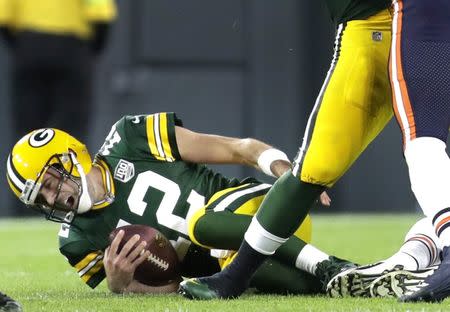 Sep 9, 2018; Green Bay, WI, USA; Green Bay Packers quarterback Aaron Rodgers is injured in the second quarter against the Chicago Bears at Lambeau Field. Mandatory Credit: William Glasheen/Appleton Post-Crescent via USA TODAY NETWORK