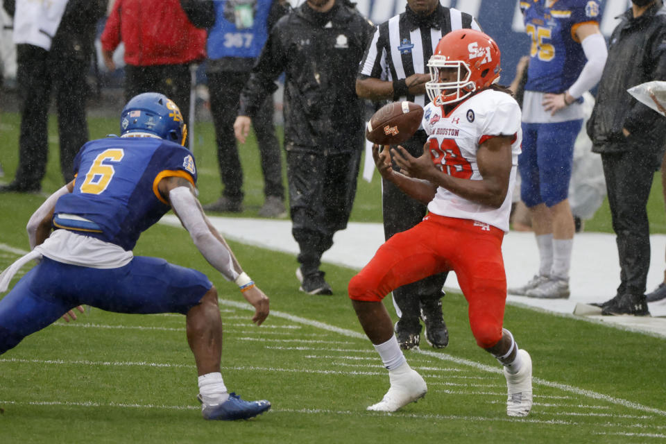 Sam Houston State wide receiver Chandler Harvin (88) makes a catch in front of South Dakota State safety Michael Griffin II (6) during the first half of the NCAA college FCS Football Championship in Frisco, Texas, Sunday, May 16, 2021. (AP Photo/Michael Ainsworth)