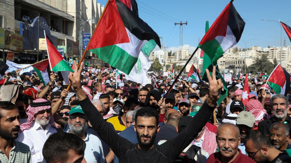 Jordanians gather during a pro-Palestine protest in Amman, on October 20, to express solidarity with civilians in Gaza.  - Alaa Al Sukhni/Reuters