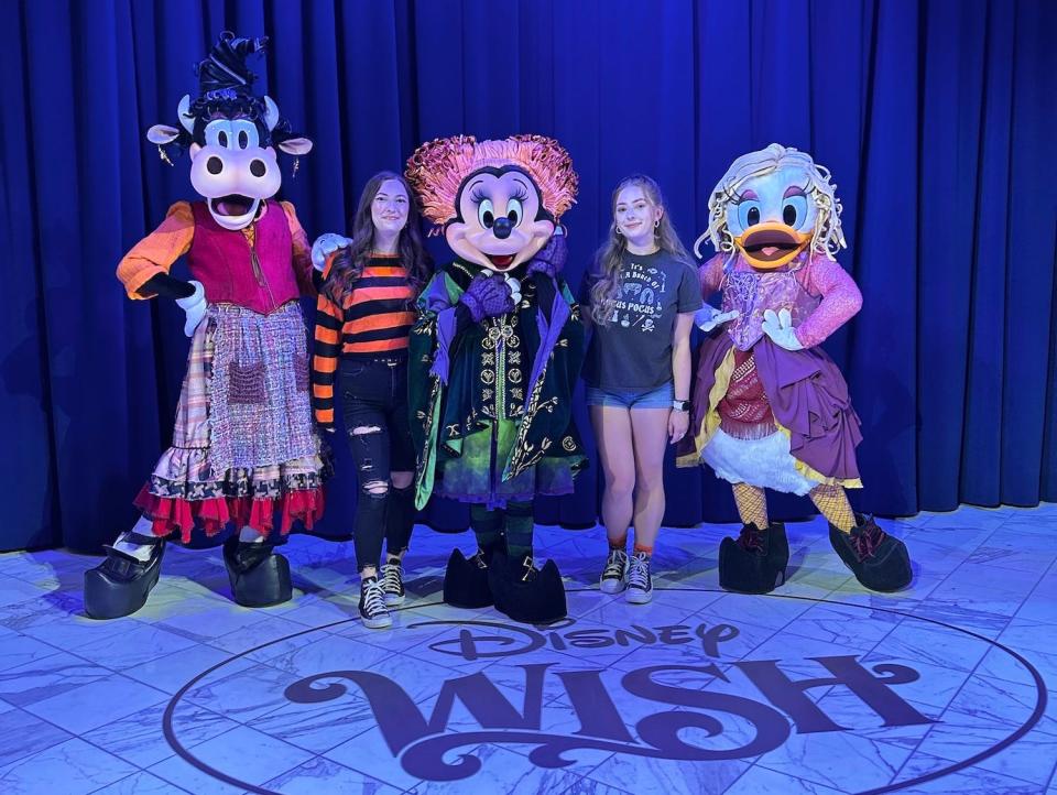 Amanda Krause and her sister with the Sanderson sisters onboard the Disney Wish.
