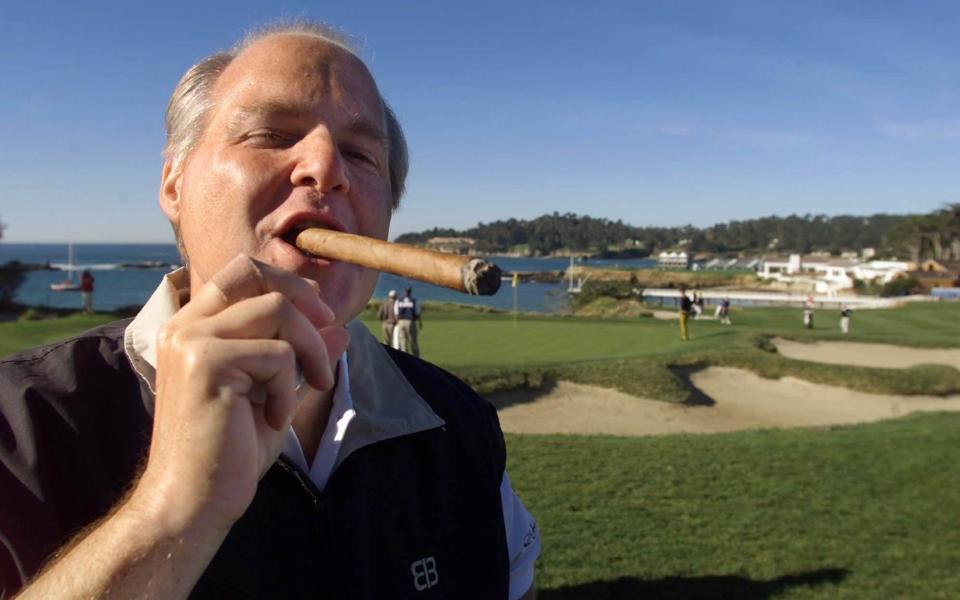 Limbaugh waits to tee off from the fifth hole at the AT&T Pebble Beach Pro-Am golf tournament in 2001 - ERIC RISBERG/AP