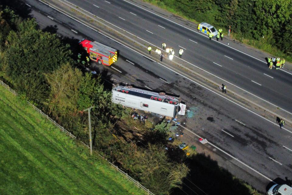 The scene of a coach crash on the M53 motorway (Peter Byrne/PA) (PA Wire)