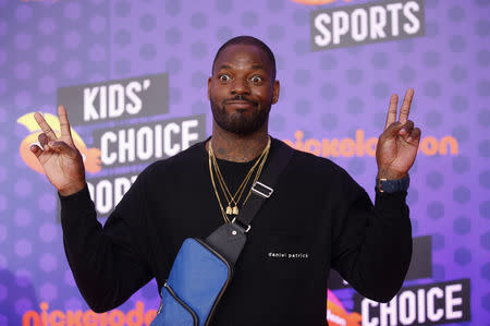 FILE PHOTO: Kids Choice Sport Awards 2018 – Arrivals – Los Angeles, California, U.S., 19/07/2018. Martellus Bennett poses. REUTERS/Danny Moloshok - HP1EE7J1PRC4Q