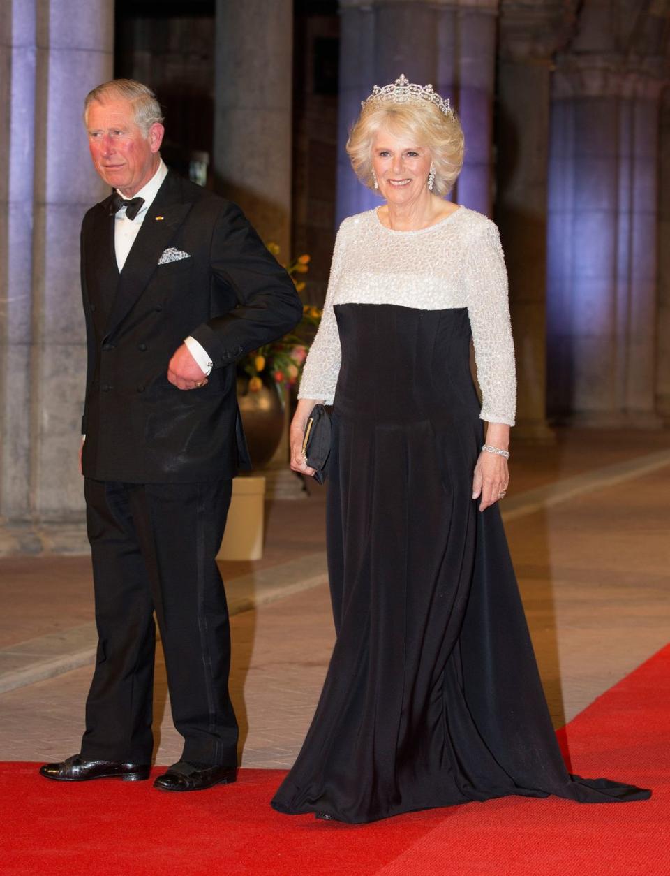 <p>Camilla wowed in a black and white dress with sequined detailing on the top, which she wore to a dinner hosted by Queen Beatrix of the Netherlands in Amsterdam. The Duchess also wore a stunning tiara to finish off her ensemble. </p>