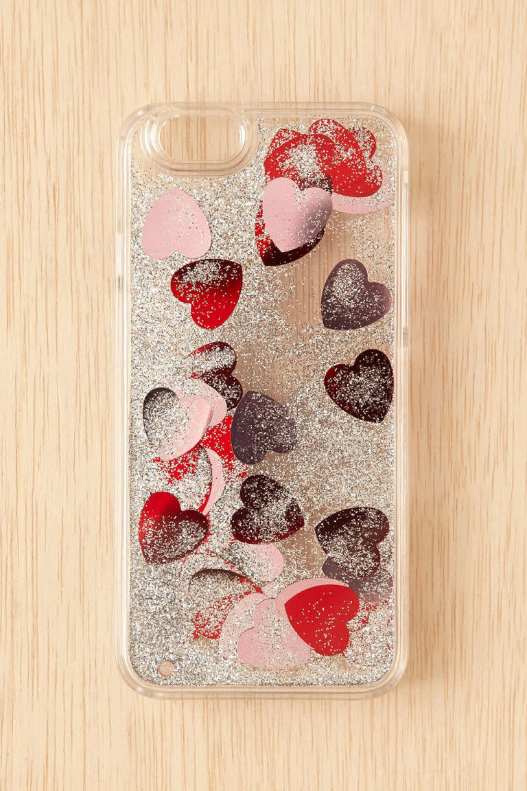 <p><a rel="nofollow noopener" href="http://www.urbanoutfitters.com/urban/catalog/productdetail.jsp?id=38217121&category=SEARCH+RESULTS" target="_blank" data-ylk="slk:Falling Hearts Glitter Case for iPhone 6/6s;elm:context_link;itc:0;sec:content-canvas" class="link "><i>Falling Hearts Glitter Case for iPhone 6/6s</i></a><i>, URBAN OUTFITTERS, $20</i></p>