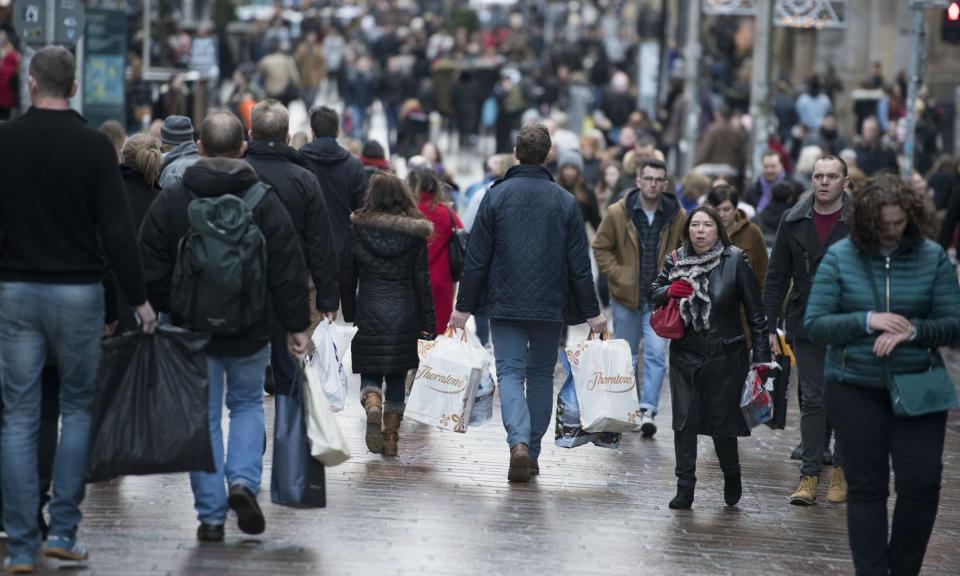 <span>Shoppers in Buchanan Street in Glasgow. Barclays said card spending fell 0.6% in June. </span><span>Photograph: John Linton/PA</span>