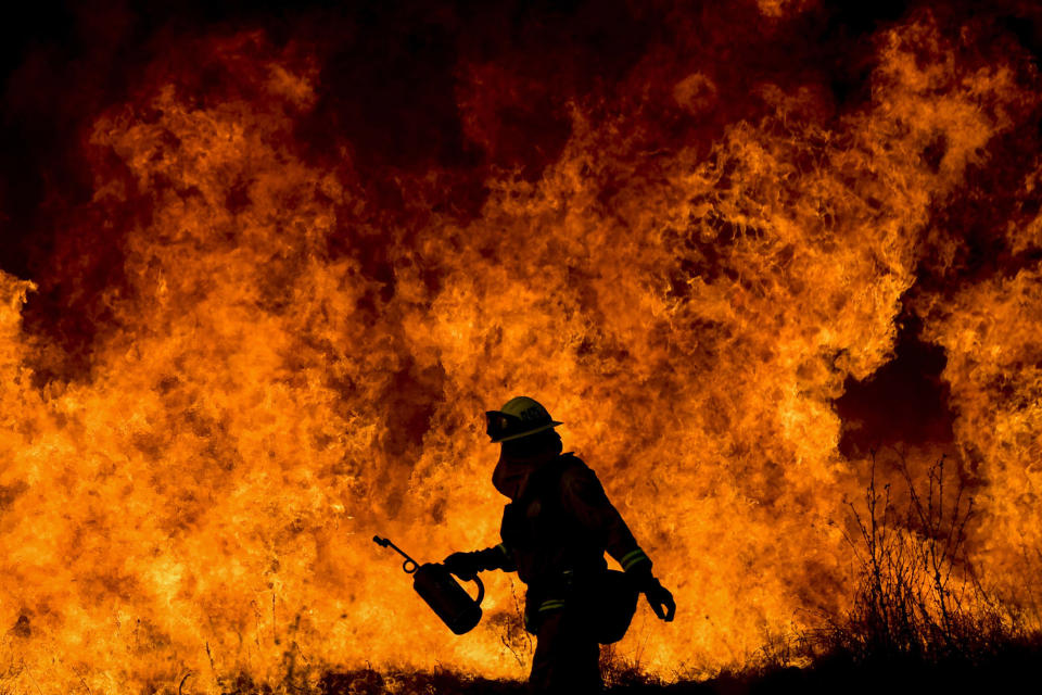 <p>The Thomas fire burns on December 9 in Los Padres National Forest.</p>