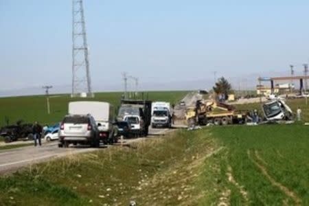 A military vehicle, damaged by a remote control bomb, is pictured near Diyarbakir, Turkey February 18, 2016. A bomb detonated by remote control killed seven Turkish security force members travelling in a military vehicle in southeast Turkey on Thursday, security sources said, a day after a car bomb attack in the capital Ankara killed 28 people. The blast hit the armoured vehicle on the highway linking Diyarbakir, the largest city in the mainly Kurdish southeast, to the district of Lice. Sources had previously said the explosion hit a convoy of vehicles. REUTERS/Sertac Kayar