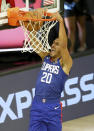 Los Angeles Clippers guard Landry Shamet (20) dunks during the second half against the Portland Trail Blazers in an NBA basketball game Saturday, Aug. 8, 2020, in Lake Buena Vista, Fla. (Kim Klement/Pool Photo via AP)