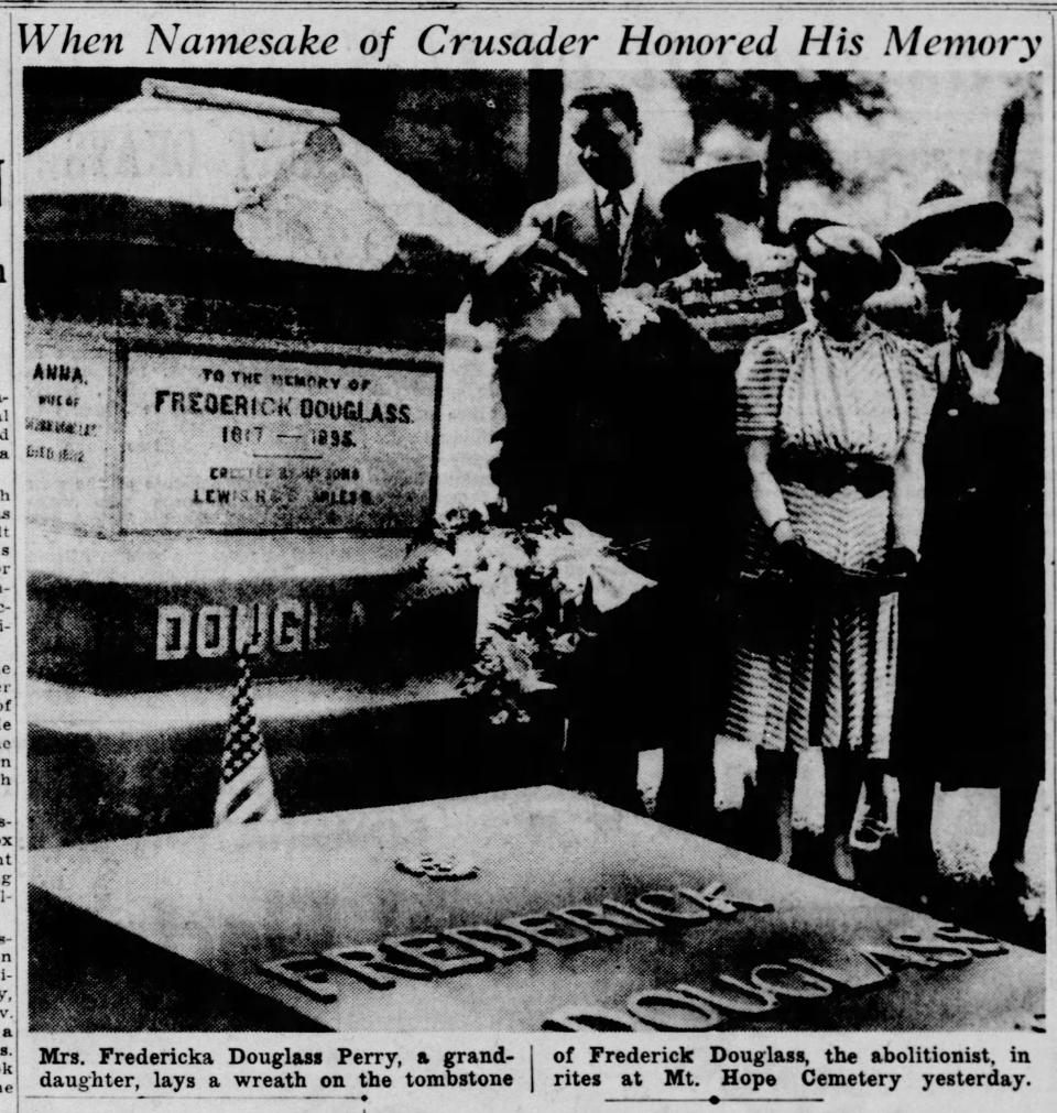 Fredericka Douglass Sprague Perry, granddaughter of Frederick Douglass, lays a wreath at his gravestone in 1939.