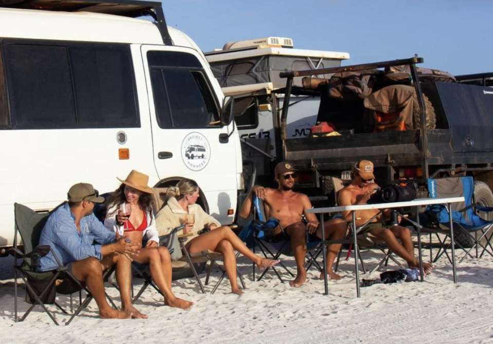 Penny and Bernie pictured with friends on the beach. 