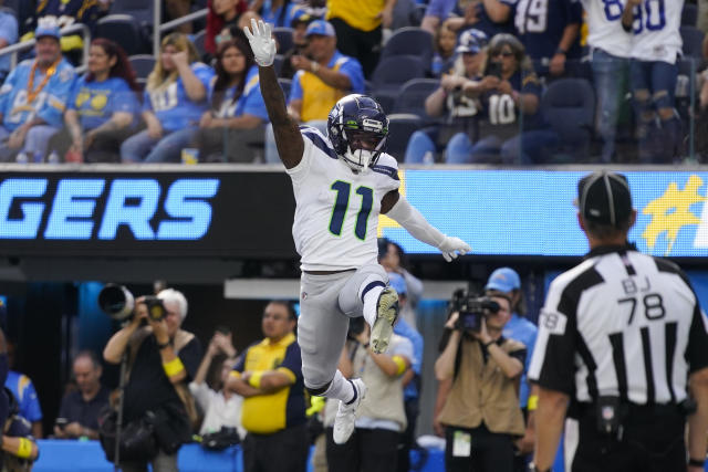 Seattle Seahawks wide receiver Marquise Goodwin runs with the ball during  an NFL football game against the Las Vegas Raiders, Sunday, Nov. 27, 2022,  in Seattle.The Raiders won 40-34 in overtime. (AP