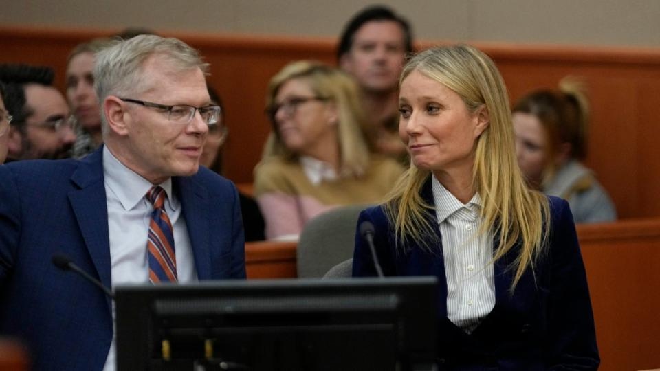 A ‘pleased’ Paltrow and attorney Steve Owens react as the verdict is read in her civil trial (Getty Images)